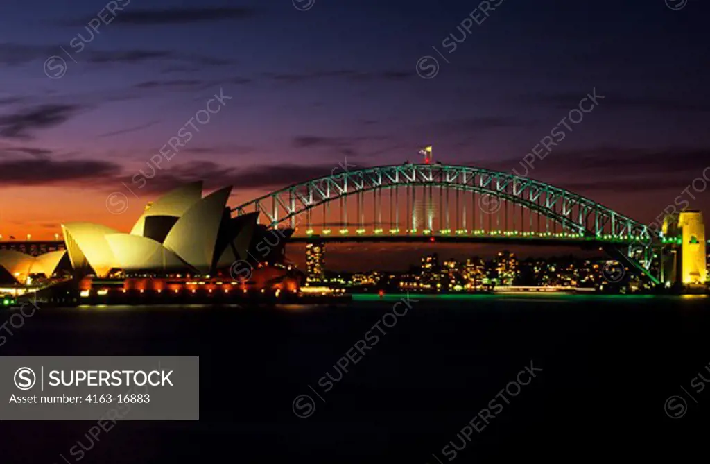 AUSTRALIA, SYDNEY, VIEW OF OPERA HOUSE AND SYDNEY HARBOUR BRIDGE, NIGHT