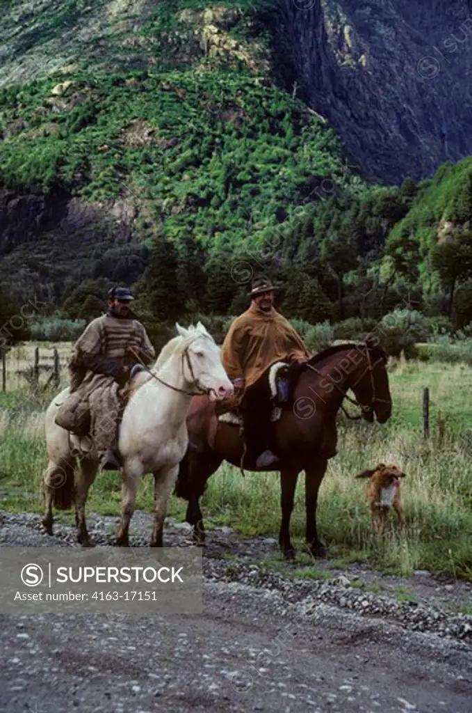 CHILE, (SOUTHERN CHILE) GAUCHOS ON HORSEBACK