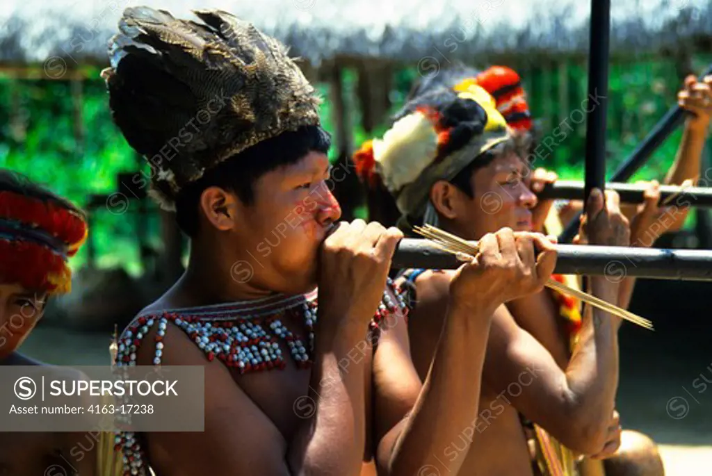 AMAZON RIVER, JIVARO INDIANS WITH BLOWGUNS