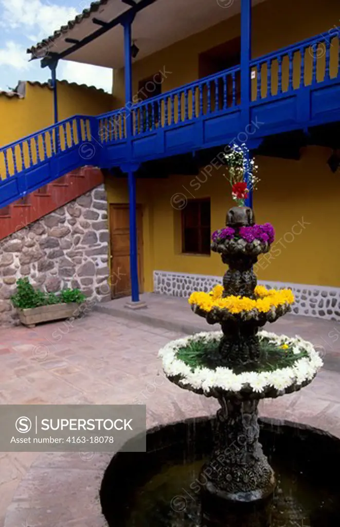 PERU, NEAR CUZCO, SACRED VALLEY, POSADA DEL INCA HOTEL, DECORATED FOUNTAIN