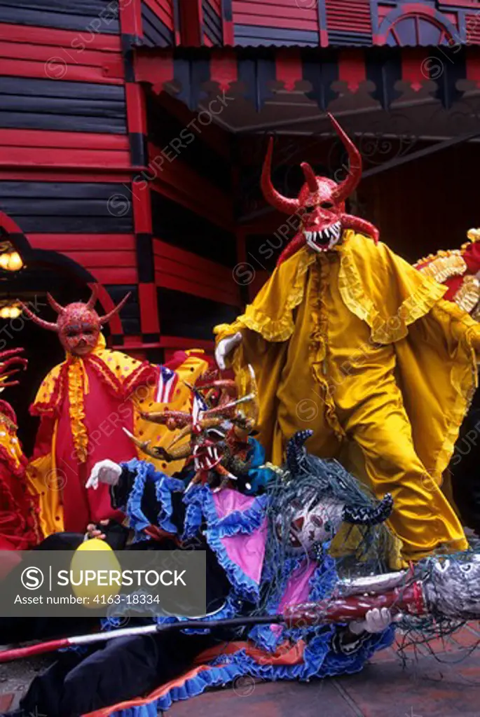 PUERTO RICO, PONCE, PEOPLE IN VEJIGANTES COSTUMES (USED FOR FESTIVALS), MASKS
