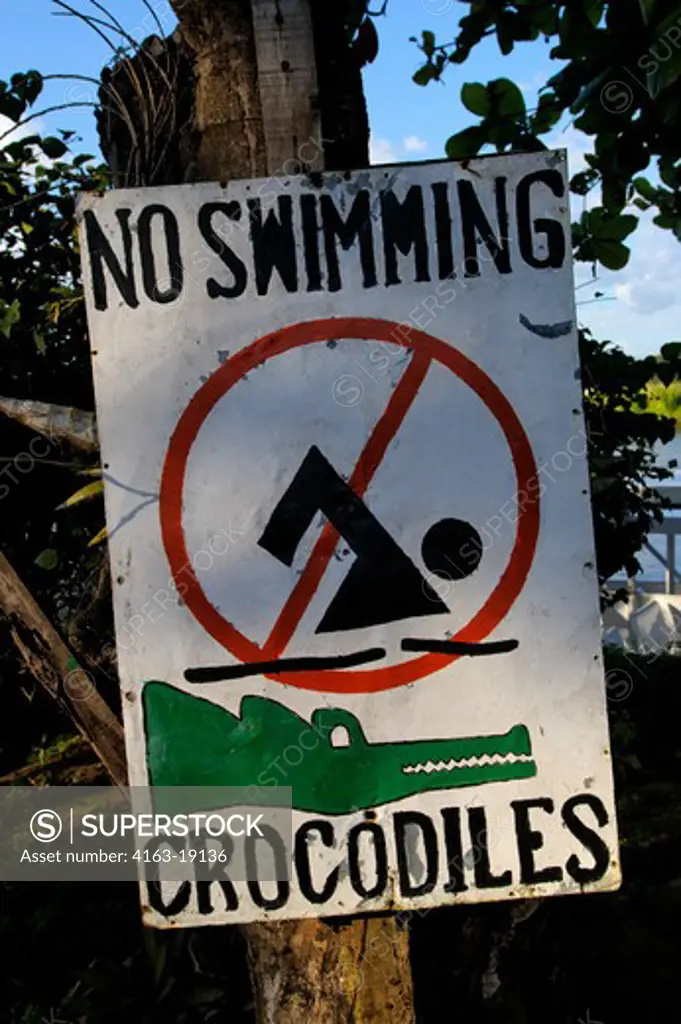 COSTA RICA, RIO TARCOLES, DON'T SWIM WITH THE CROCODILES WARNING SIGN