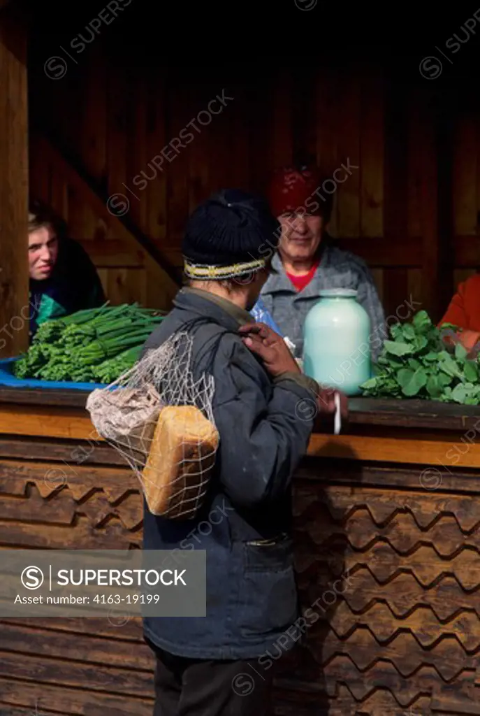 RUSSIA, SIBERIA MAGDAGACHI WOMEN SELLING GOODS