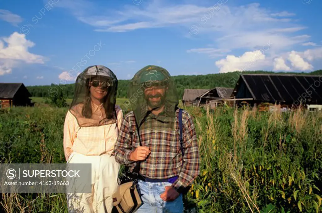 RUSSIA, SIBERIA, YENISEY RIVER, LEBED, NATURE PRESERVE, PASSENGERS WITH MOSQUITO NETS