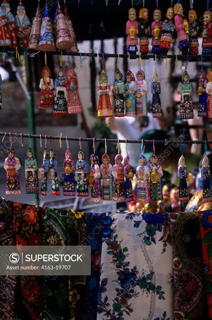 RUSSIA, MOSCOW, OLD ARBAT STREET, COLORFUL WOODEN DOLLS AND SCARVES FOR SALE
