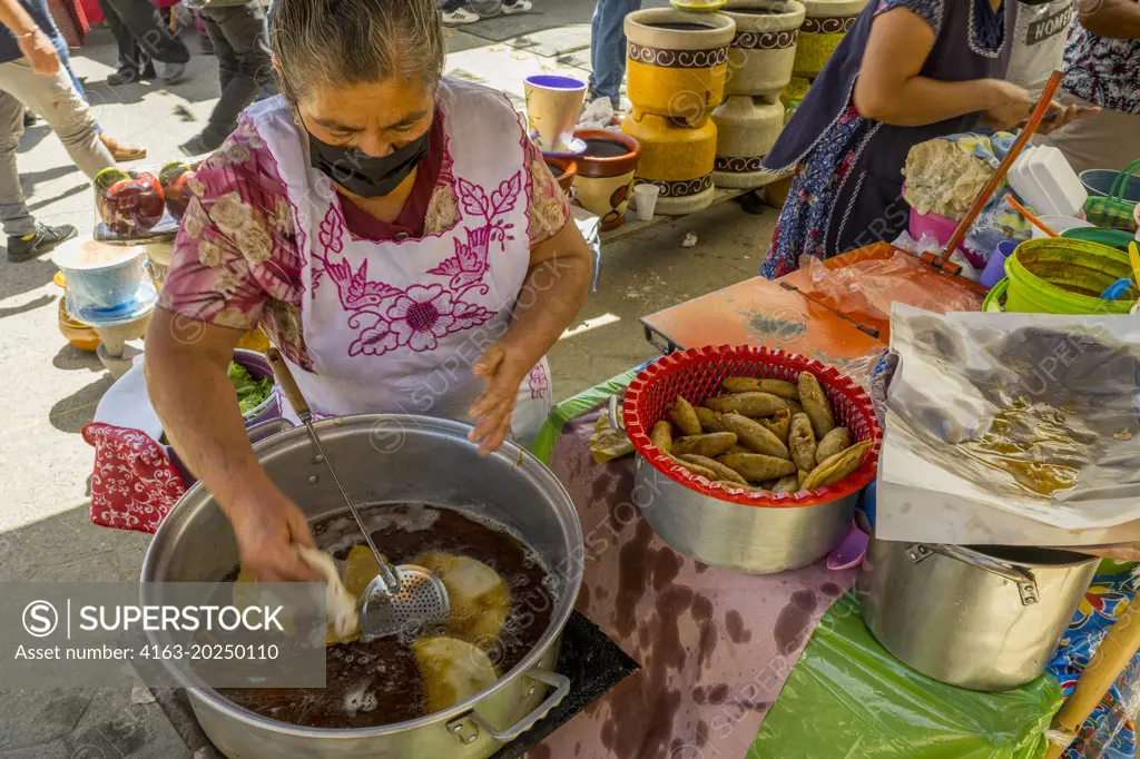 A street kitchen id selling meals on the weekly indigenous market in the small town of Zaachila near Oaxaca City, Mexico.