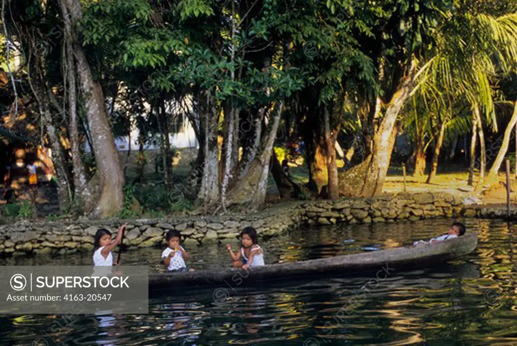 Guatemala, Rio Dulce, Rain Forest, Mayan Girls In Canoe