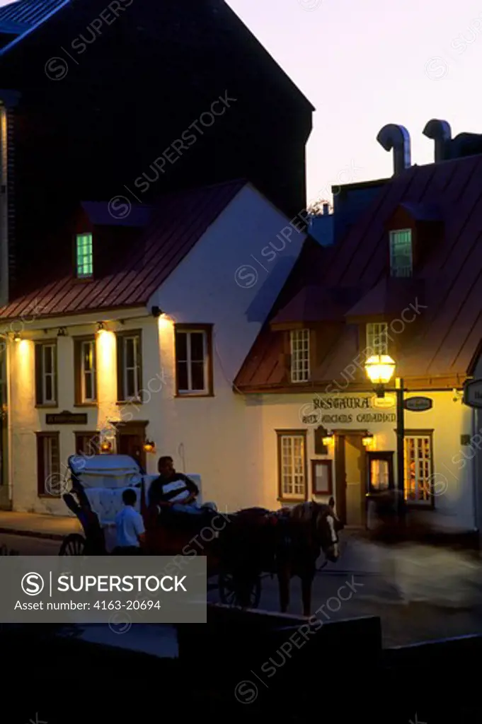 Canada,Quebec,Quebec City, Restaurant 'Aux Anciens Canadiens' With Horse Carriage At Night