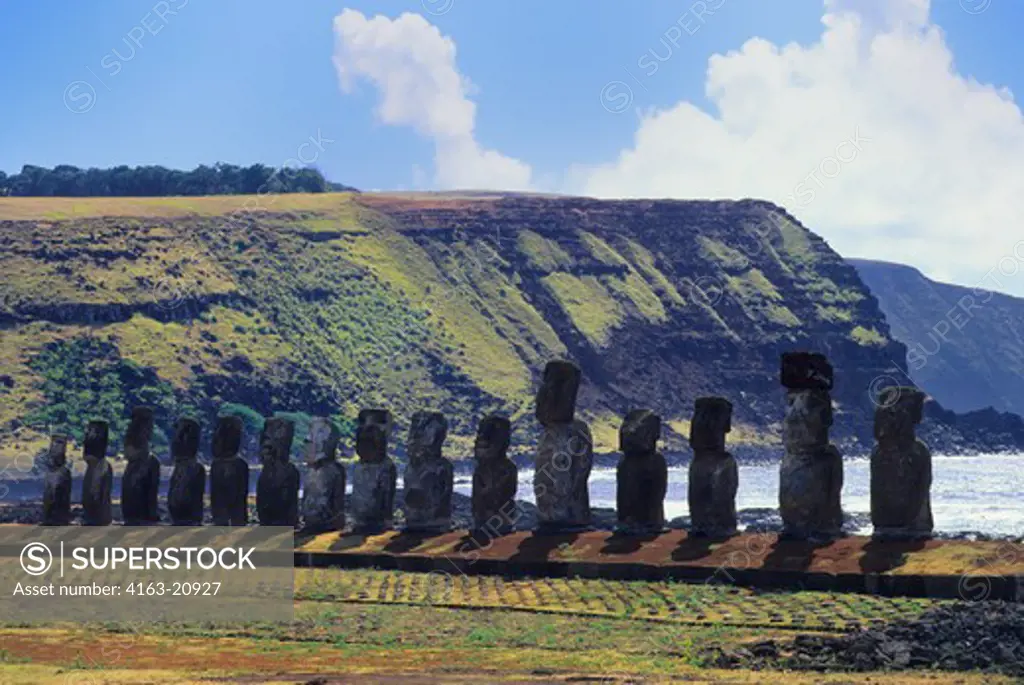 Chile, Easter Island, Ahu Tongariki, Moai Statues With Coast In Background