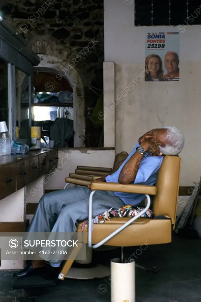 Brazil, Salvador De Bahia, Pelourinho Distict, Barber Shop, Barber Asleep In Chair