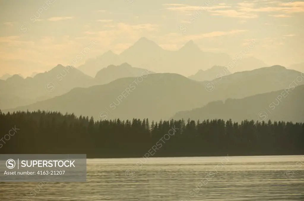 View of Fairweather mountain range with Mount Fairweather in evening light from the Sitakaday Narrows near Bartlett Cove, Glacier Bay National Park, Alaska, USA