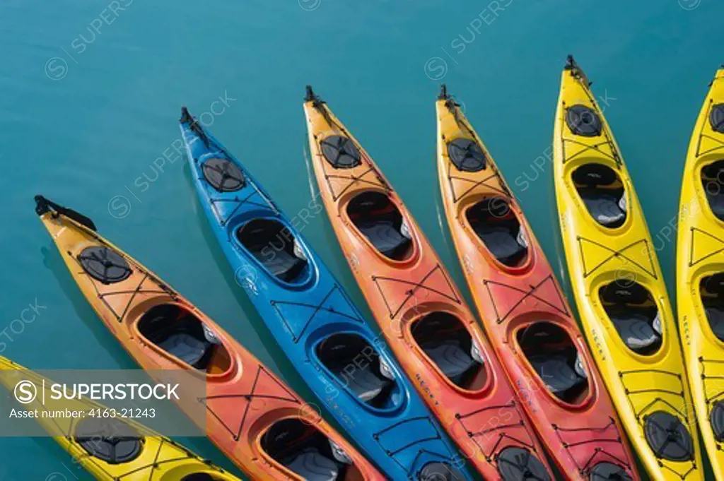 Sea kayaks next to cruise ship Safari Endeavour near Reid Glacier in Glacier Bay National Park, Alaska, USA