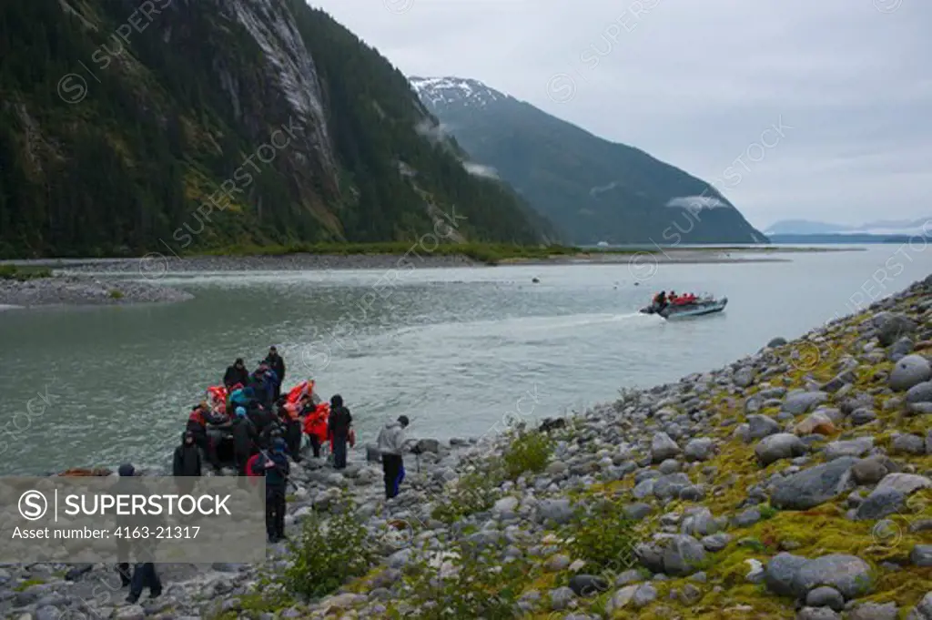 Hikers at Baird Glacier in Scenery Cove, Thomas Bay, Tongass National Forest, Alaska, USA