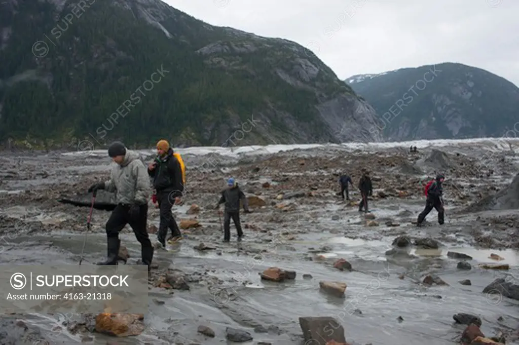Hikers at Baird Glacier in Scenery Cove, Thomas Bay, Tongass National Forest, Alaska, USA