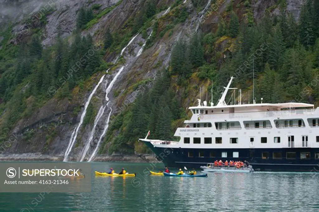 Passengers from the cruise ship Safari Endeavour sea kayaking at Fords Terror, Endicott Arm, Tongass National Forest, Alaska, USA