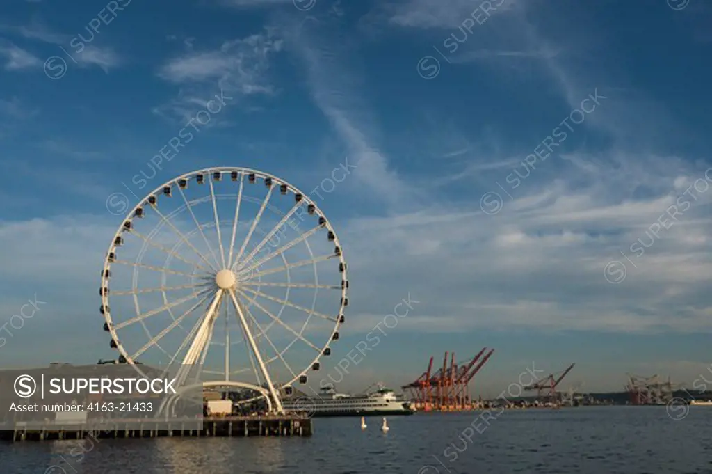 View From Seattle Waterfront Park Of The Great Wheel (Ferris Wheel) At Seattle'S Pier 57 With Ferry In Background, Washington State, Usa