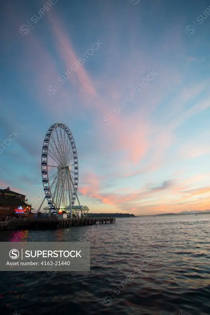 View At Sunset From Seattle Waterfront Park Of The Great Wheel (Ferris Wheel) At Seattle'S Pier 57, Washington State, Usa
