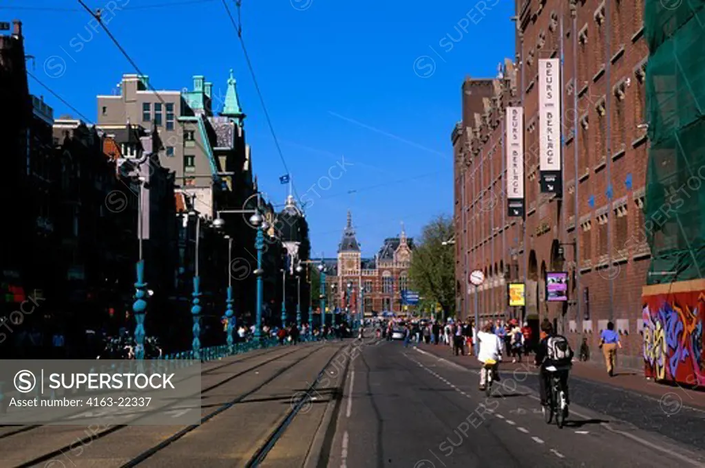Netherlands, Holland, Amsterdam, Street Scene, Voorburgwal Street, Central Station In Background