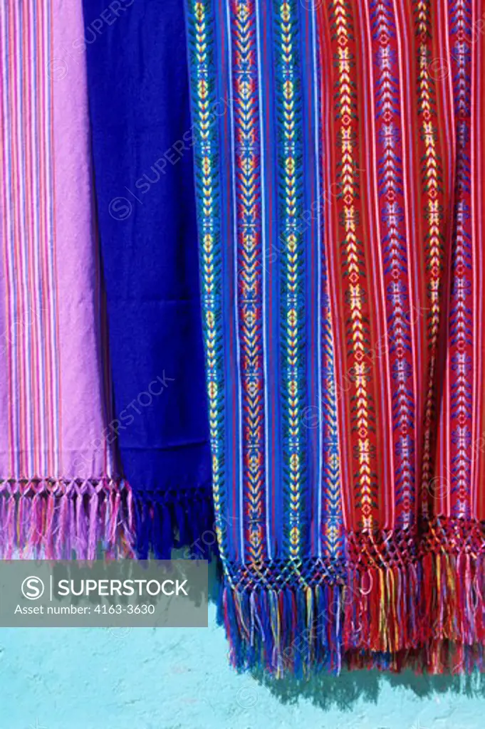 MEXICO, CHIHUAHUA, CREEL, STREET SCENE, COLORFUL INDIAN FABRICS FOR SALE