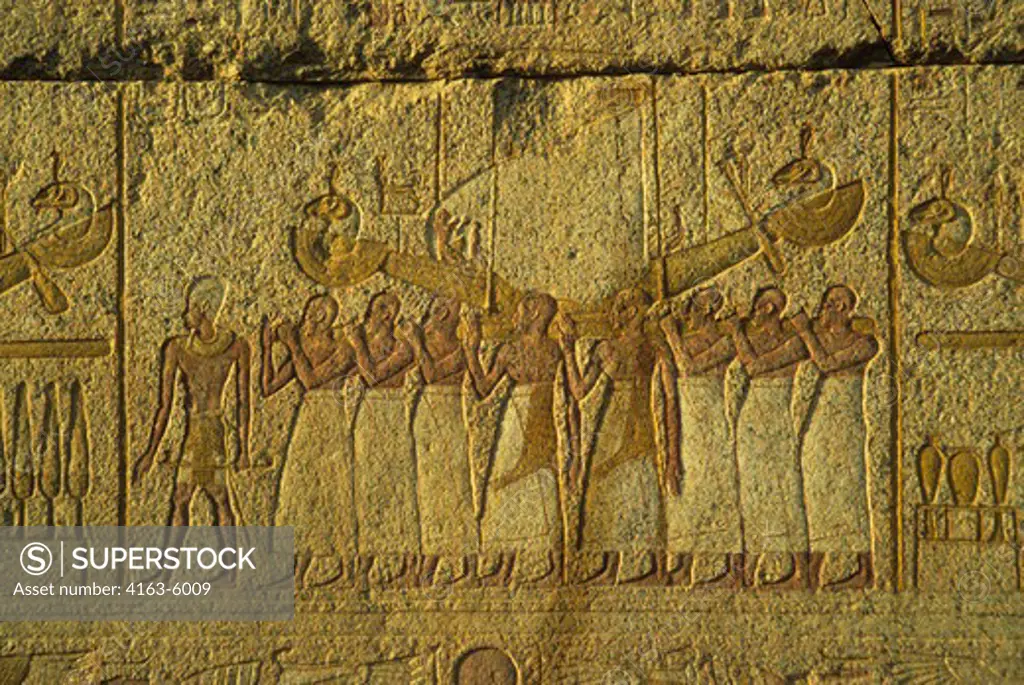 EGYPT, LUXOR, TEMPLE OF KARNAK, ANCIENT EGYPTIAN HIEROGLYPHICS ON TEMPLE WALL