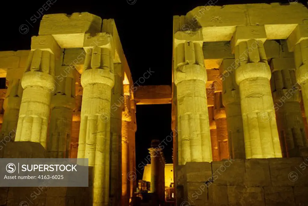 EGYPT, LUXOR, TEMPLE OF LUXOR ILLUMINATED AT NIGHT