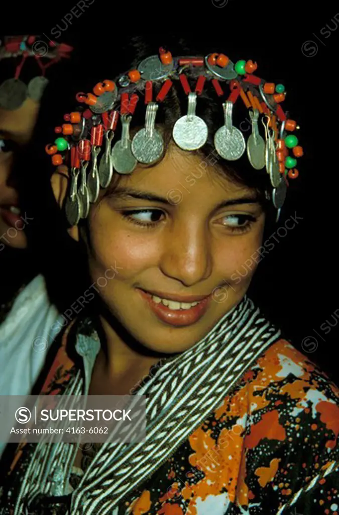 MOROCCO, YOUNG BERBER GIRL WITH TRADITIONAL HEADDRESS MADE WITH COINS