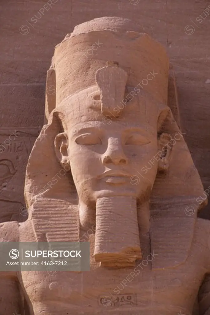 EGYPT, ABU SIMBEL, GREAT TEMPLE OF ABU SIMBEL, STATUE OF RAMSES II, CLOSE-UP