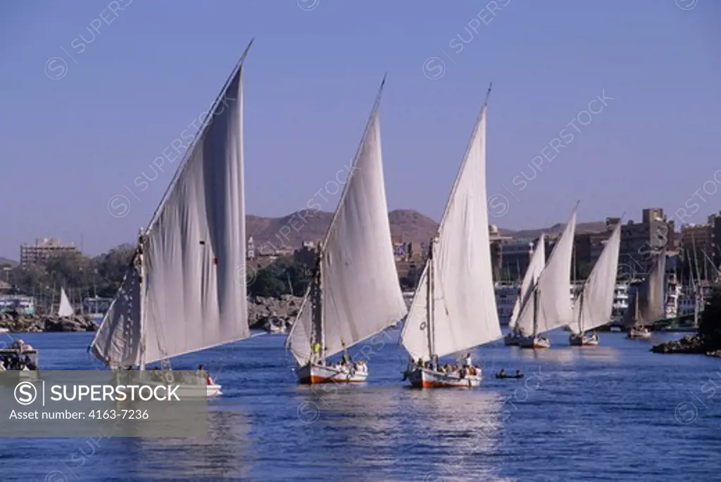EGYPT, ASWAN, NILE RIVER, FELUCCAS WITH TOURISTS