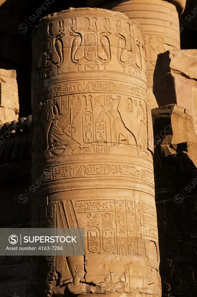 EGYPT, NILE RIVER, KOM OMBO TEMPLE, COLUMN WITH RELIEF CARVINGS