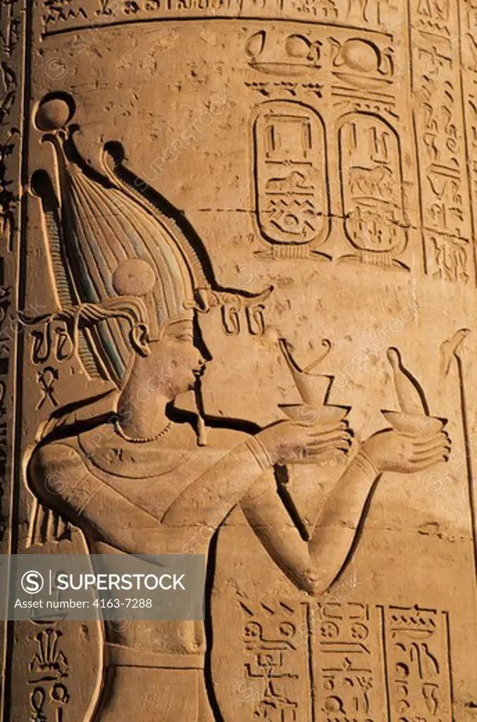 EGYPT, NILE RIVER, KOM OMBO TEMPLE, COLUMN WITH RELIEF CARVING, CLOSE-UP