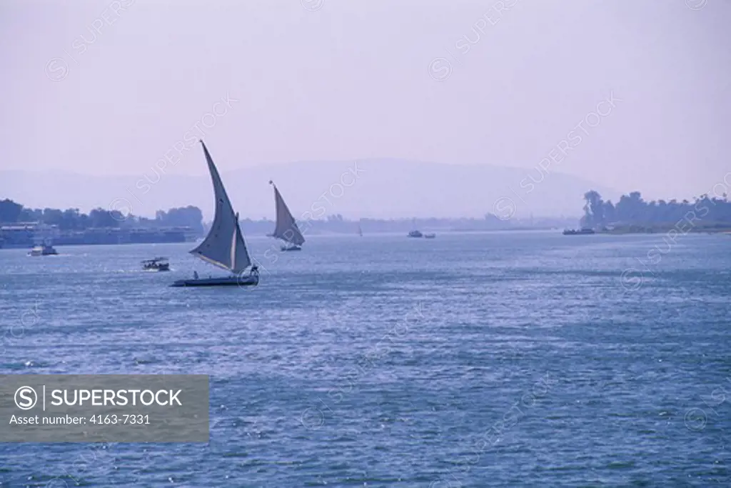 EGYPT, NILE RIVER AT LUXOR, FELUCCAS