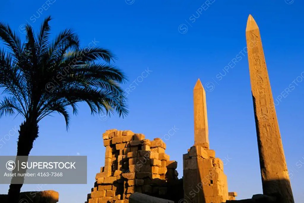 EGYPT, NILE RIVER, LUXOR, TEMPLE OF KARNAK, TUTHMOSIS' OBELISK RIGHT, HATSHEPSUT'S LEFT