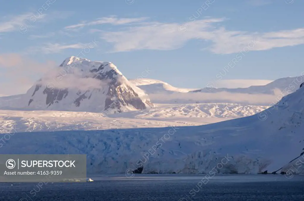 ANTARCTICA, ANTARCTIC PENINSULA, LEMAIRE CHANNEL, MOUNTAINS AND GLACIERS IN EVENING LIGHT