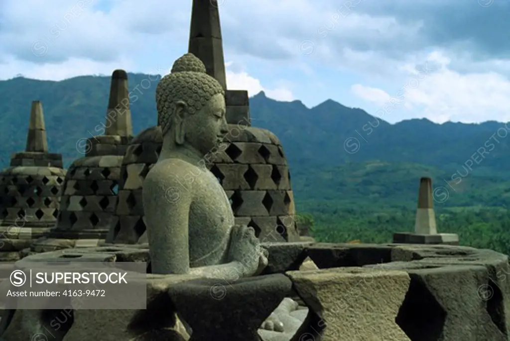INDONESIA, JAVA, MAGELANG, CENTRAL JAVA, BOROBUDUR BUDDHIST TEMPLE, UPPER TERRACE WITH BELL STUPAS & BUDDHA STATUES