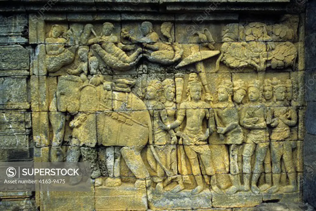 INDONESIA, JAVA, MAGELANG, CENTRAL JAVA, BOROBUDUR BUDDHIST TEMPLE, STONE CARVINGS AND BASS RELIEFS