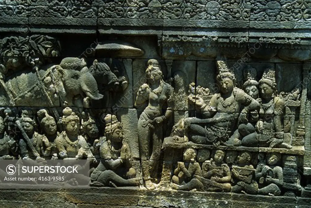 INDONESIA, JAVA, MAGELANG, CENTRAL JAVA, ANCIENT BOROBUDUR BUDDHIST TEMPLE, BASS RELIEFS FOUND THROUGHOUT TEMPLE