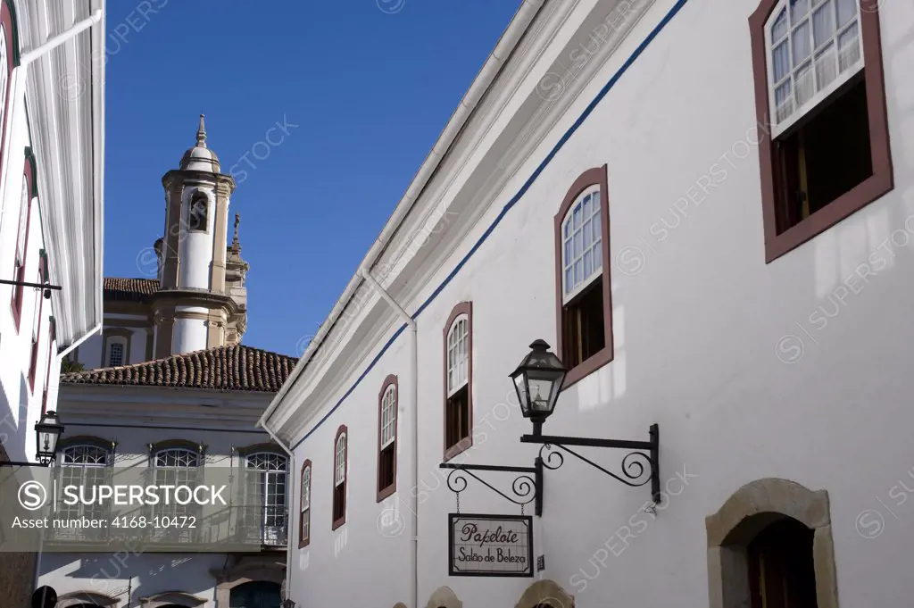 Brazil, Minas Gerais, Colonial Town Of Ouro Preto (Unesco World Heritage Site), Street Scene With Brazil, Minas Gerais, Colonial Town Of Ouro Preto (Unesco World Heritage Site), Church Of Our Lady Of Mount Caramel In Background
