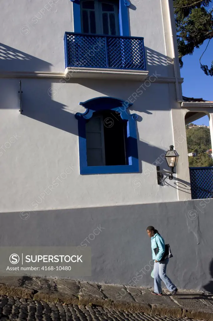 Brazil, Minas Gerais, Colonial Town Of Ouro Preto (Unesco World Heritage Site), Street Scene With Woman Walking Uphill