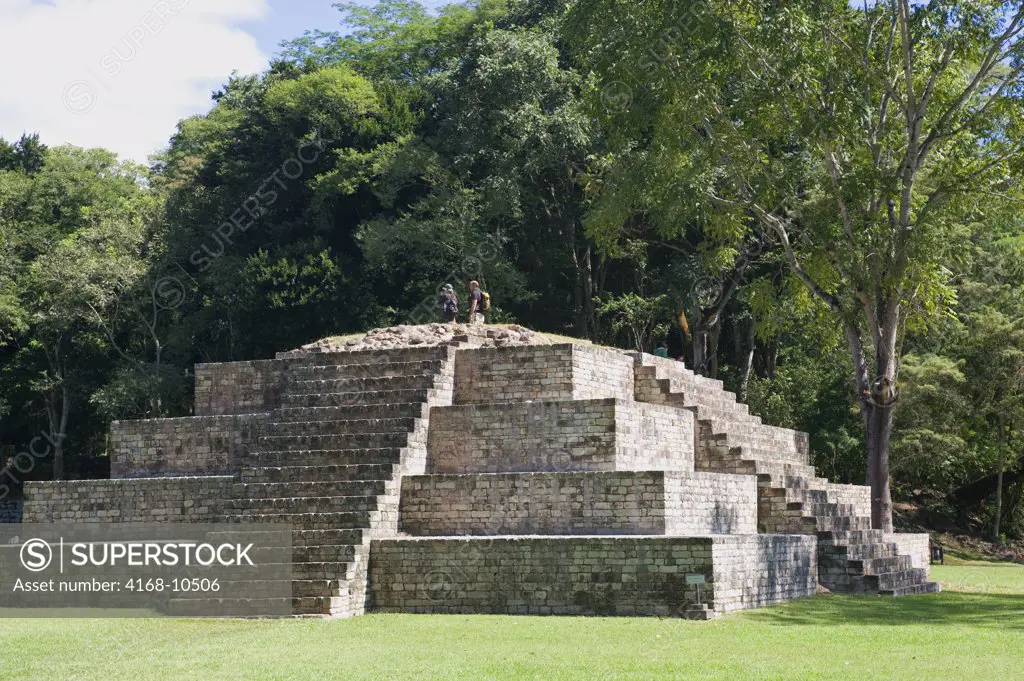 Honduras, Copan Ruins, Mayan Archaelogical Site, View Of Great Plaza, Tourists On Top  Of Mayan Pyramid