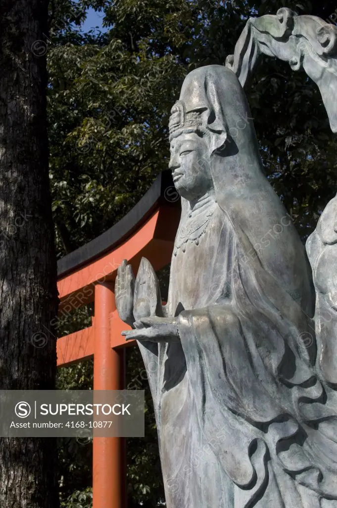 Japan, Kyoto, Arashiyama,Tenryuji Temple, Statue Of Buddha,  Torii Gate In Background