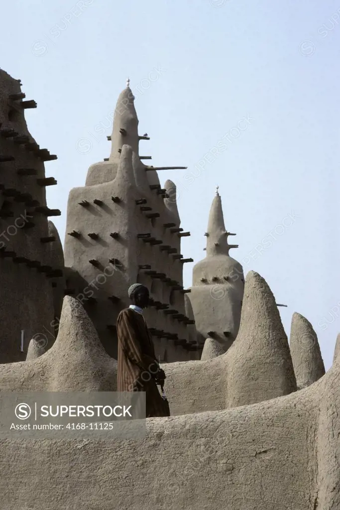 Mali, Djenne, Mosque Built Out Of Mud Brick Construction, Muezzin Calling For Prayer