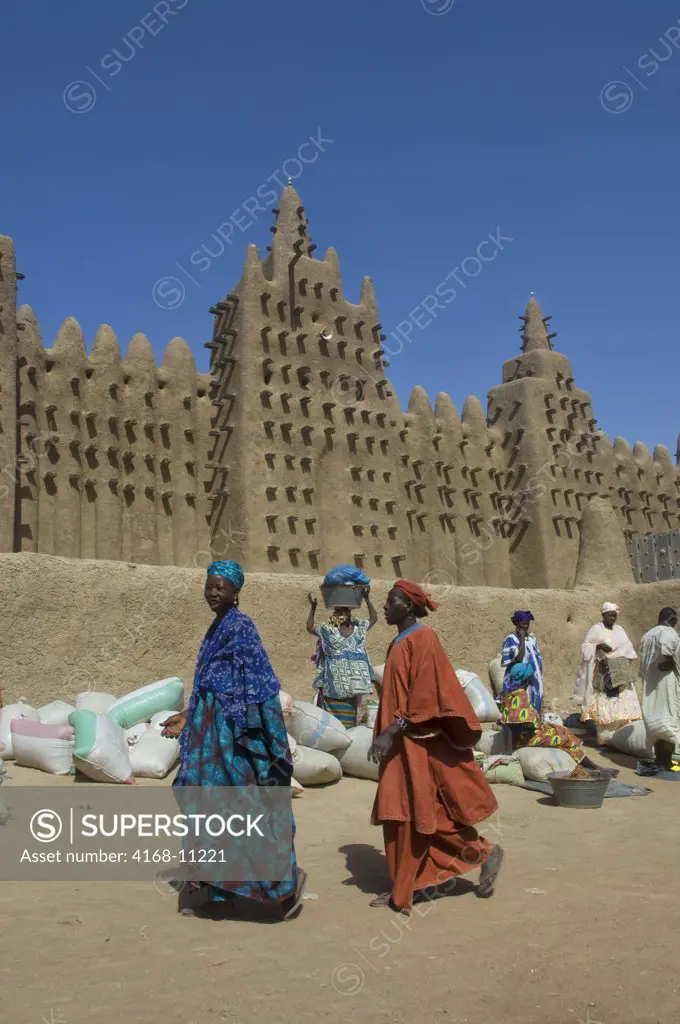 Mali, Djenne, People Setting Up Market In Square In Front Of Mosque, Mud Brick Building, World Heritage Site
