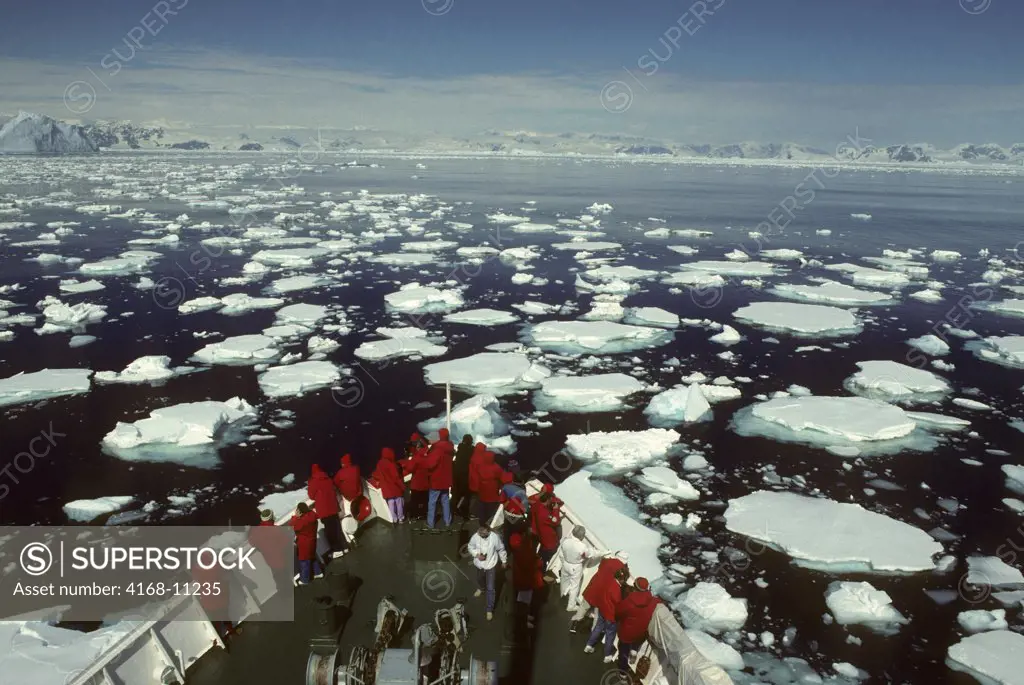 Antarctic Peninsula Area, Ms Explorer Going Through Pack Ice, With Passengers On Bow