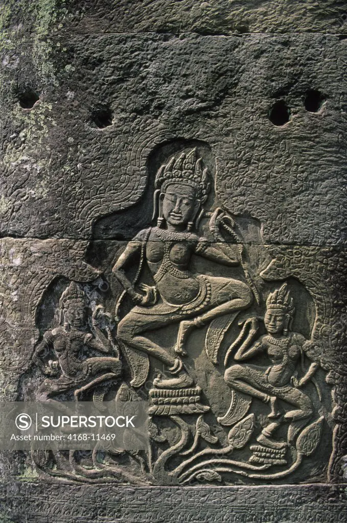 Cambodia, Angkor, Angkor Thom, Bayon Temple, Apsara Carving In Gallery With Bullet Holes From Khmer Rouge Time Period