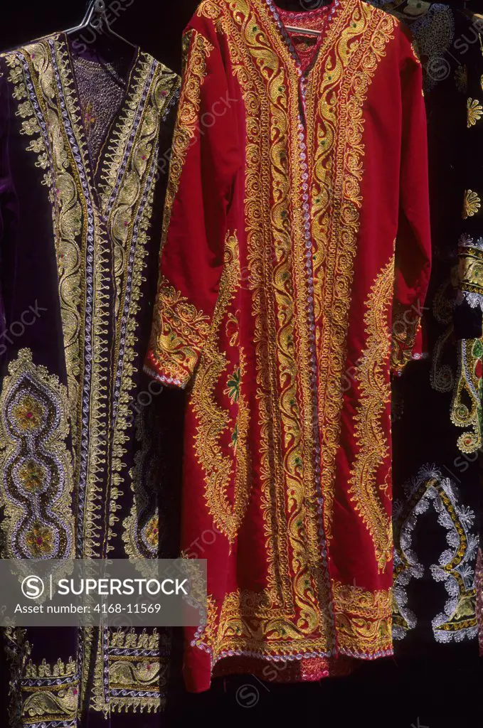 Uzbekistan, Bukhara, Market Scene With Embroidered Silk Dresses