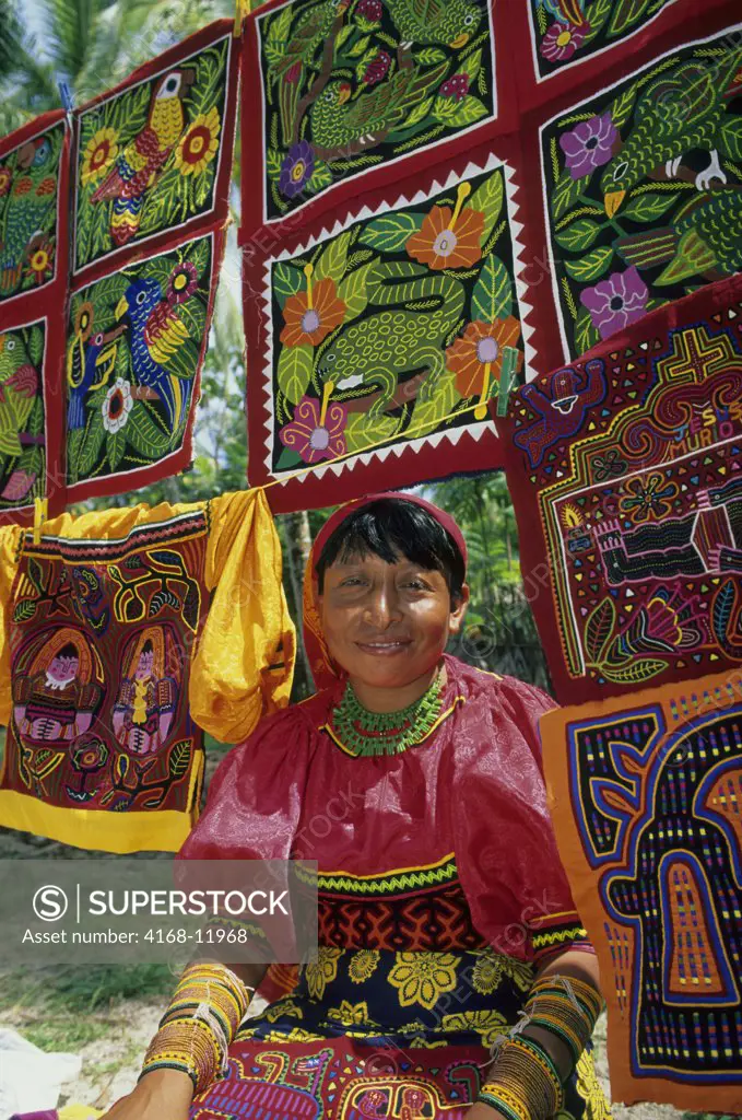 Panama, San Blas Islands, Acuatupu Island, Kuna Indian Woman With Molas (Appliqued Garments)