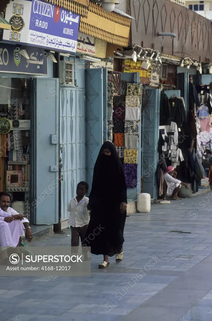 Saudi Arabia, Jeddah, Old Town, Souk Al-Alawi, Veiled Woman With Boy