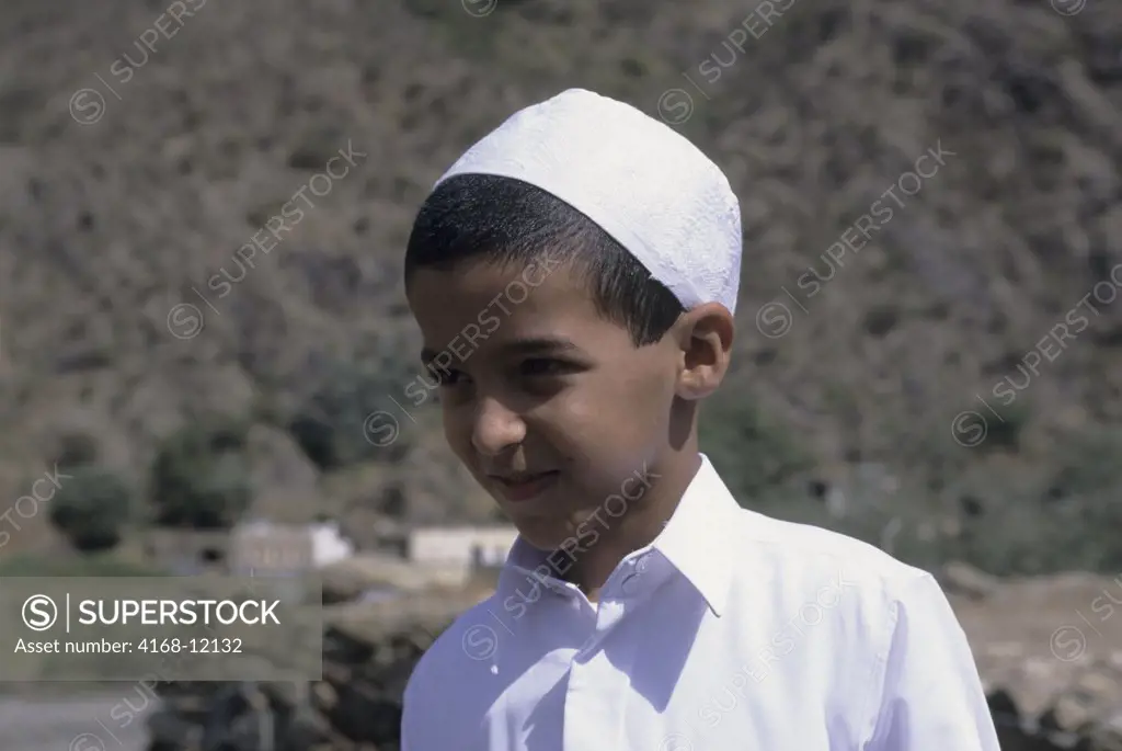 Saudi Arabia, Near Abha, Wadi Al Aws, Portrait Of Local Boy