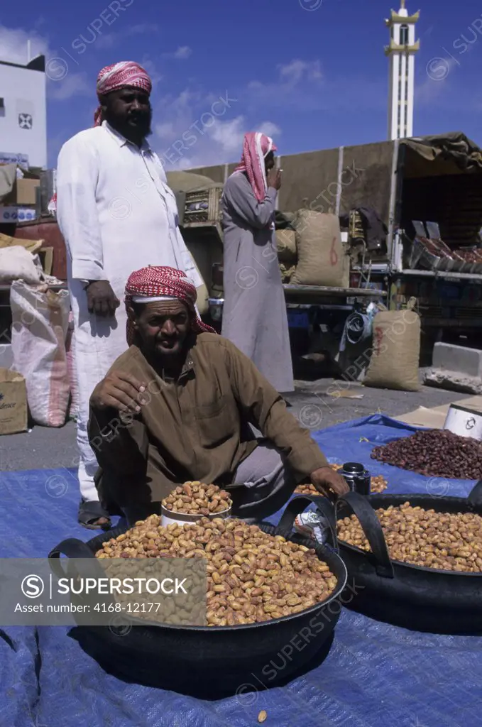 Saudi Arabia, Near Abha, Al Wadijan, Friday Market, Man Selling Dates