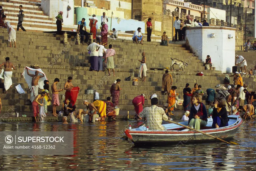 India, Varanasi, Ganges River, Tourists In Boat Watching The Pilgrims
